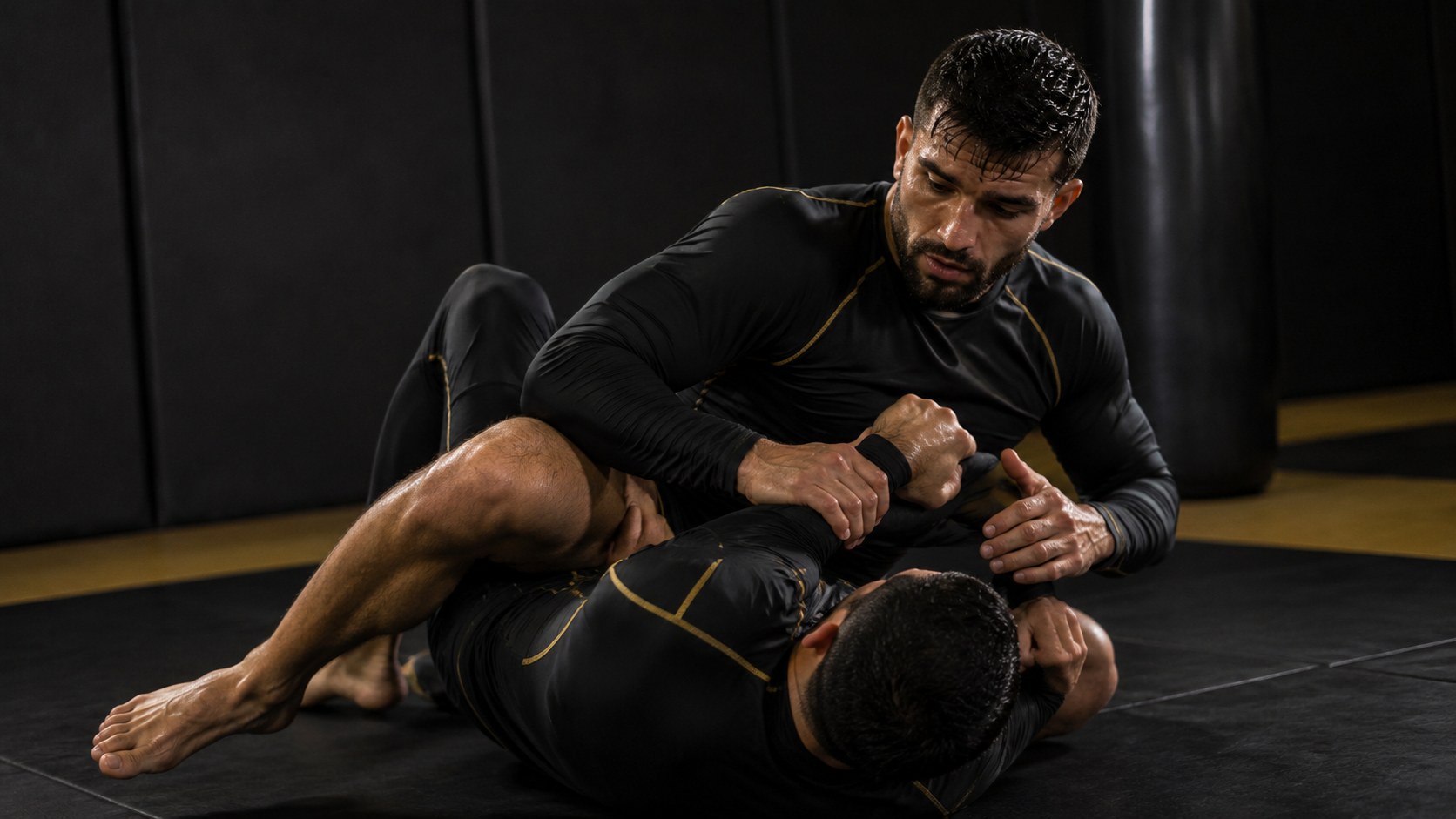 Grappling athletes wearing custom compression kit